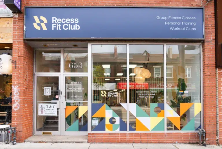 Exterior photo of Recess Fit Club gym with a colourful sign and display